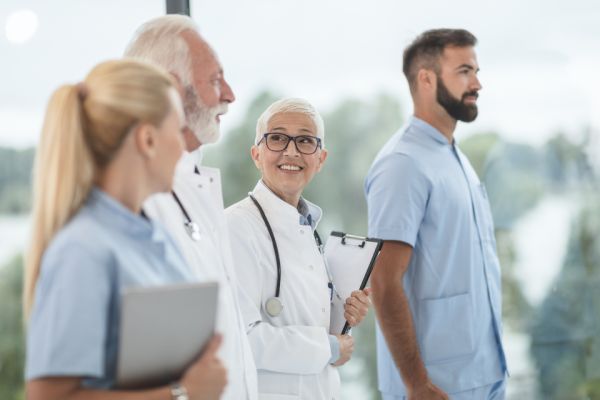 Team of registered nurses and clinicians in scrubs in Sacramento