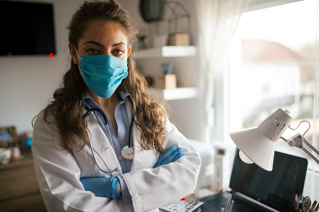 Healthcare clinician in a clinical office during a consultation