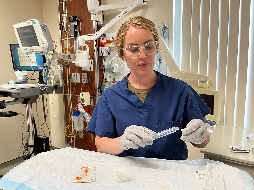 Per diem nurse preparing medication while covering a hospital shift