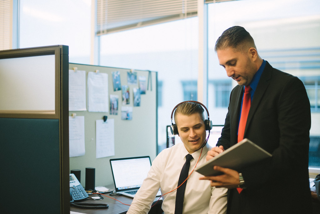 Recruiters reviewing healthcare resumes together in an office